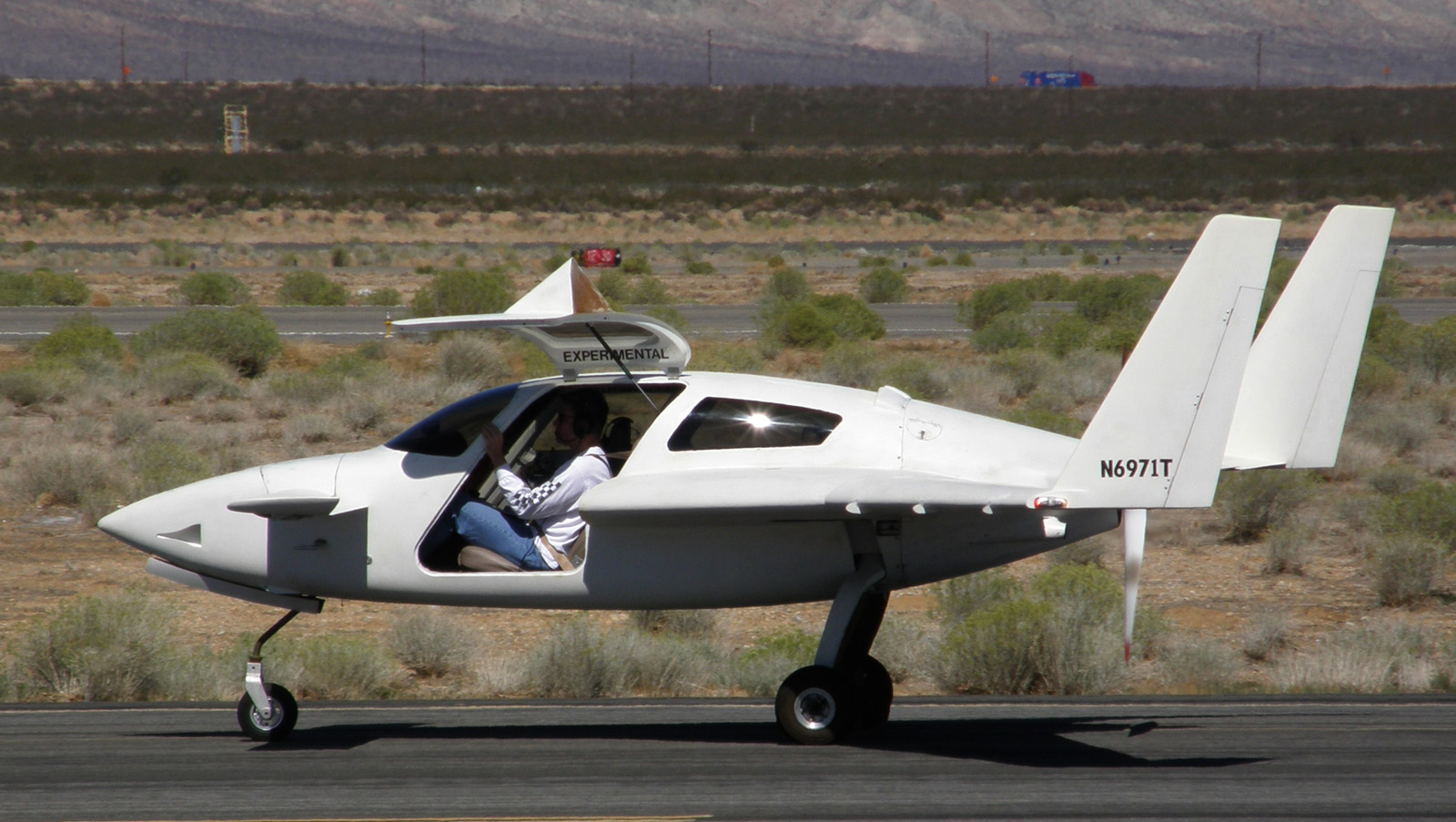 The prototype Rocket Racer, a modified Velocity SE climbing to 10,000 feet (3,000 m) on it first full flight, October 29, 2007 at the Mojave Spaceport