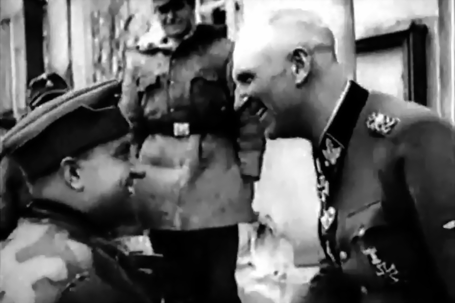 Кадр из пропагандистского киножурнала «Дойче Вохеншау», запечатлевший рукопожатие довольных Хоффмана и Гилле