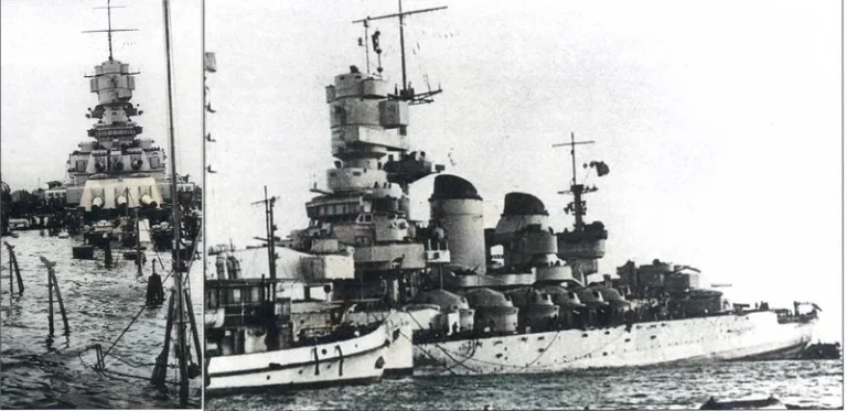       Итальянский линкор "Литторио" после атаки в Таранто. Попадания авиаторпед привели к затоплению носовой части корабля - как можно заметить верхняя палуба ушла под воду до самых носовых башен ГК.
