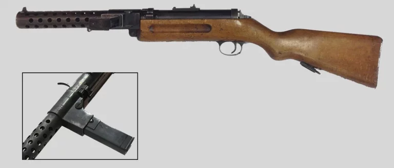       Модернизированный M.P. 18 I с прямой горловиной магазина. В некоторых источниках данная модификация указывается как M.P.18,IV, хотя маркировка на оружии оставалась прежней.