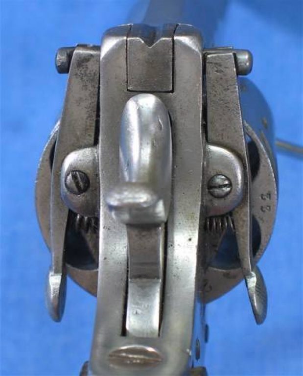 Револьвер модели «Кунэ-Прайс», вид на рычаги запирания рамки. Фото www.littlegun.be