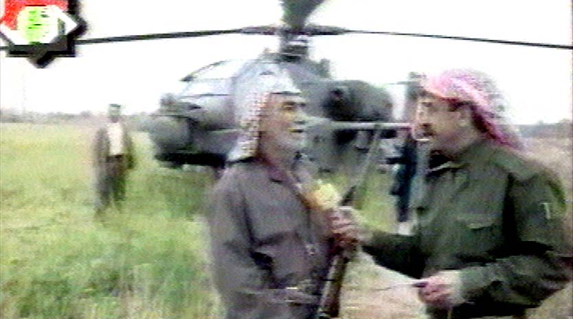 Интервью на фоне американского вертолета «Апач» на иракском телевидении, 24 марта 2003 года. Фото: Iraqi TV