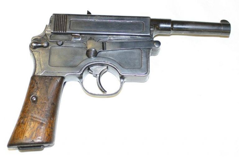     Пистолет «Витали» М1910 Терни. Хорошо видна грушевидная головка крепёжного винта. Фото http://littlegun.be