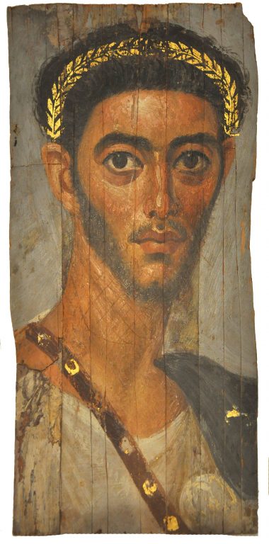 Римский военный на фаюмском портрете начала III в., Египет. Синий цвет плаща говорит, что перед нами, возможно, военный моряк Античное собрание, Берлин